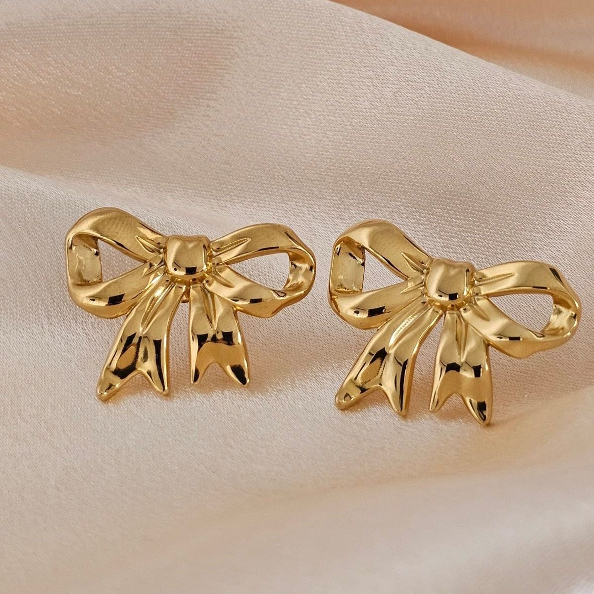 Stainless steel bow earing