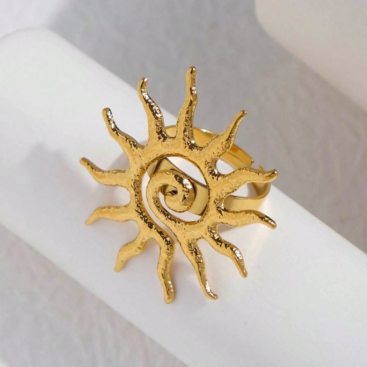 Golden sun shaped ring